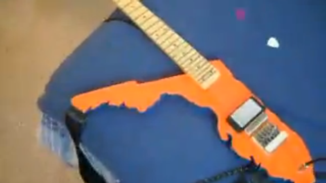 Here's a kid playing 'Highway to Hell' on a Florida-shaped guitar