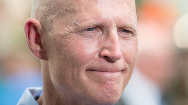 17 people were shot and killed in a Florida school, but Gov. Rick Scott says it's not time to talk about guns