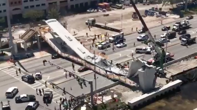 Pedestrian bridge at FIU collapses, authorities say six are dead