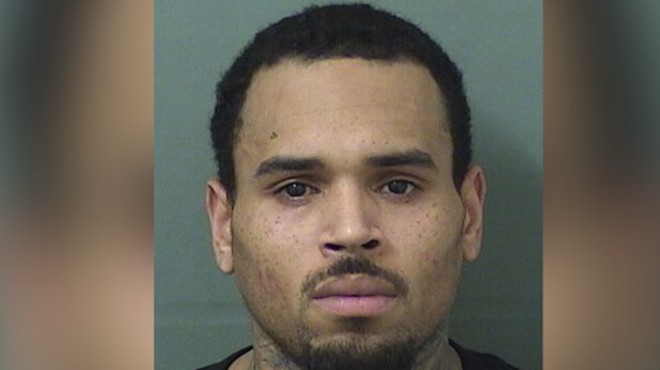 Chris Brown was arrested immediately after last night's show in Florida for felony battery