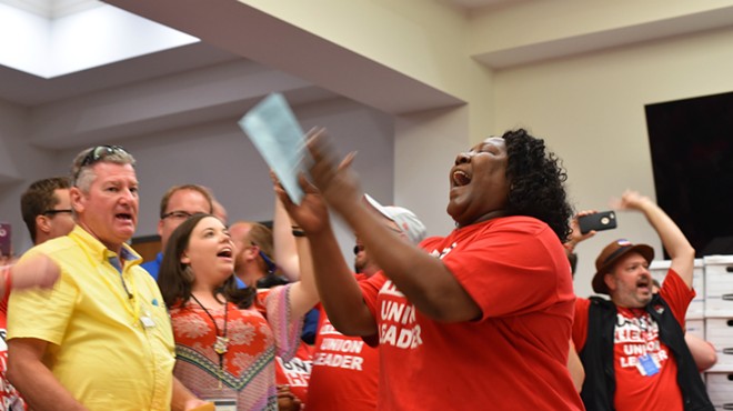 Disney union workers celebrate their historic contract agreement Thursday night.