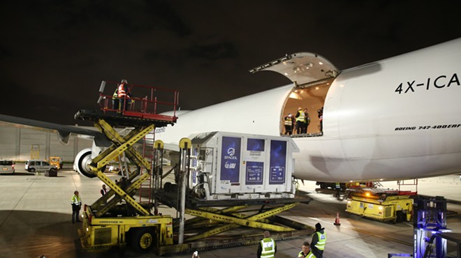 Locked in a custom shipping container, Beresheet is loaded onto a cargo plane at the Ben Gurion Airport in Israel for its flight to Orlando.