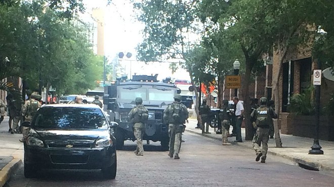 Shots were fired after a SWAT team shuts down block in downtown Orlando