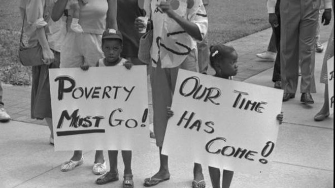 Two children protest poverty in Tallahassee in 1987.