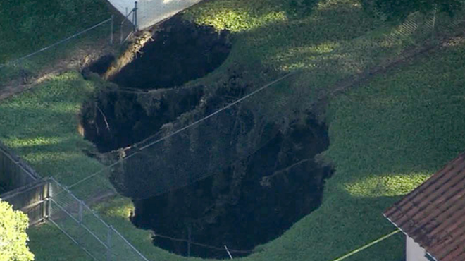 A giant sinkhole is about to devour a duplex in Hillsborough County