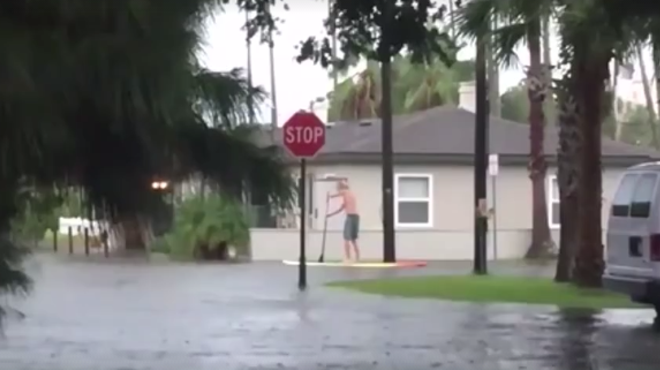 People are now paddle boarding through the streets in Florida
