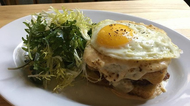 Croque madame with frisee salad.