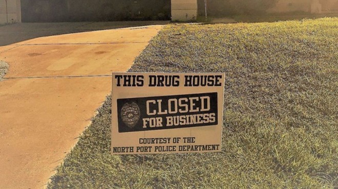 Florida cops leave 'closed for business' yard signs in front of raided homes
