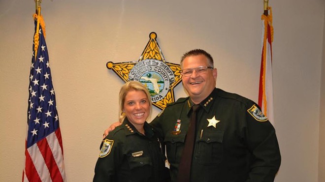 If you don't fit in with the Evangelical motto "In God We Trust," or pretend like you do, well, you can go fuck off. Brevard County Sheriff Wayne Ivey is the bro on the right.