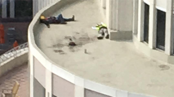 Two sleepy guys are taking a nap on the roof of Orlando City Hall right now
