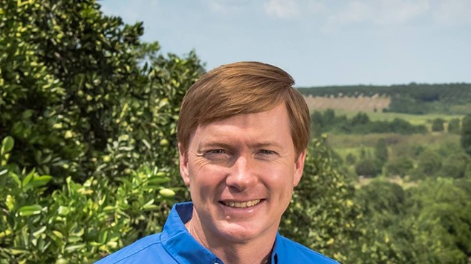 Florida GOP candidate Adam Putnam wants you to know he prefers to pack heat while eating meat