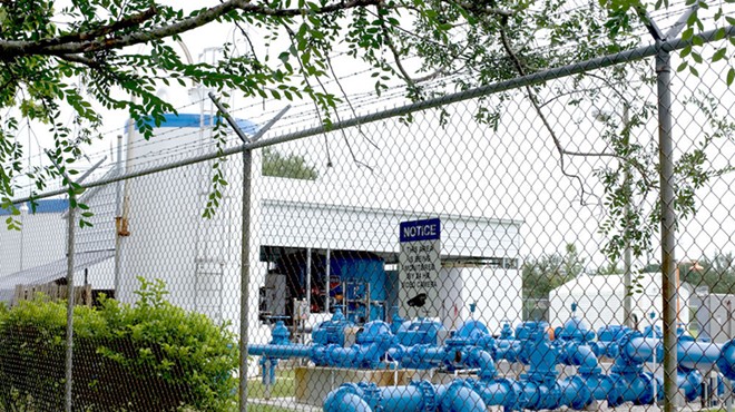 A private company wants to charge this neighborhood more for their water, even though some residents refuse to drink it