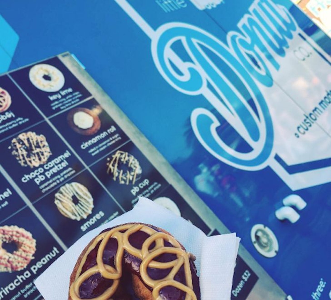 Little Blue Donut Co. 
Address: Varies
The truck roams mainly in the Windermere/Winter Garden/Lake Nona wilds, but can also be found at some Daily City Food Truck Bazaars and Tasty Tuesday events. The peanut-butter cup, Samoa (like the Girl Scout cookie) and salted caramel doughnuts will make your heart &#150; and your fillings &#150; sing.
Photo via itsmilena/Instagram