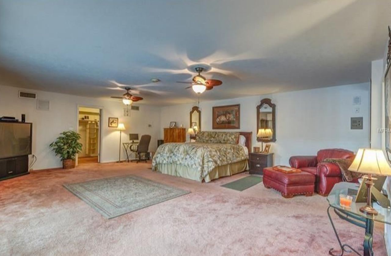 1401 Henry Balch Dr 
4 beds, 3 full baths, 2,872 sq ft, 0.46 acres lot
$210,000 
Also, this master bedroom is way too big.