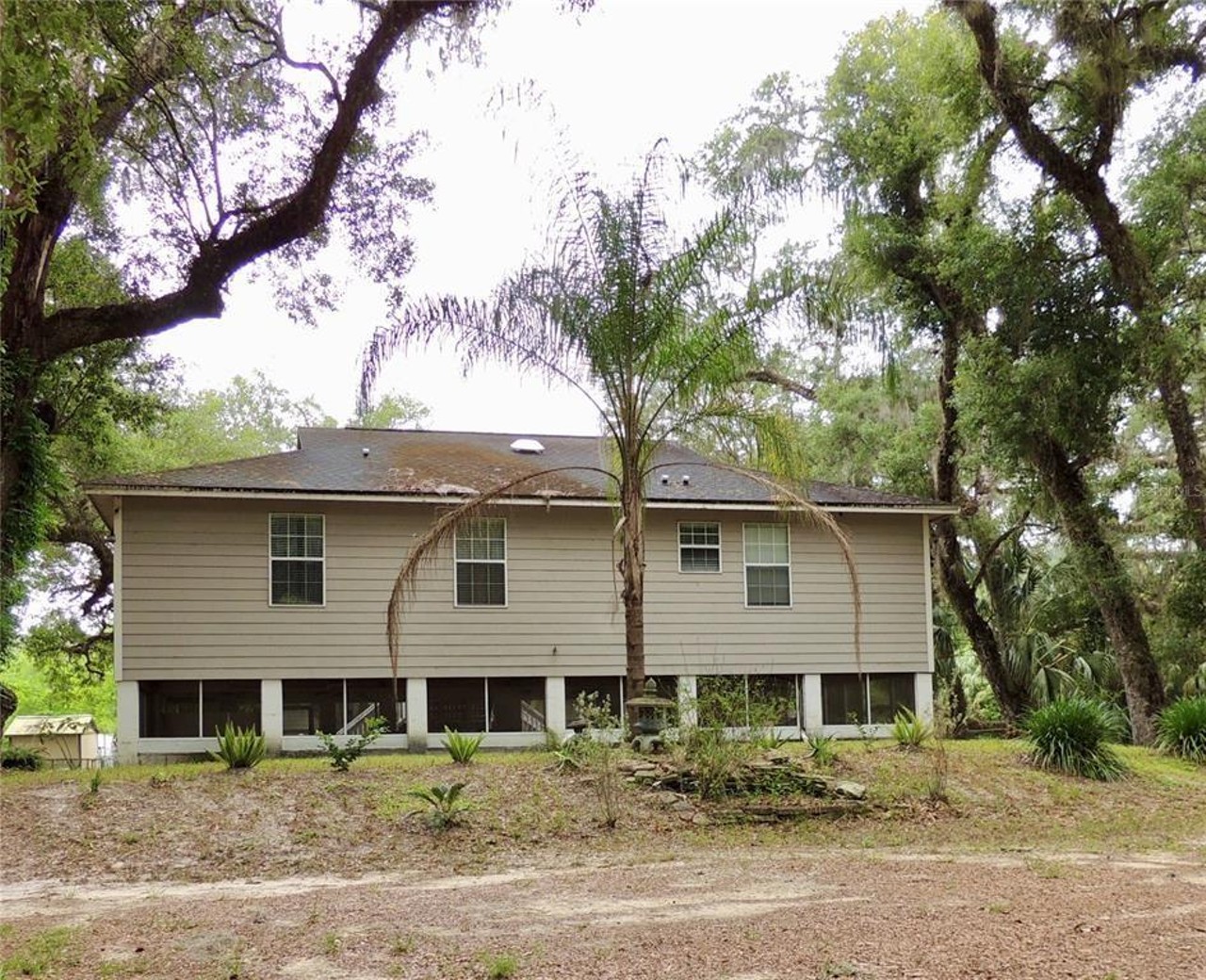 7014 E Channel Drive, Hernando 
PRICE:$169,000
This three-bed, two-bath home along the Withlacoochee River in Hernando already has the most nerve-wracking part of waterfront living covered. The stilts underneath this elevated home will let the house age to something closer to its Old Florida oak tree surroundings. 
