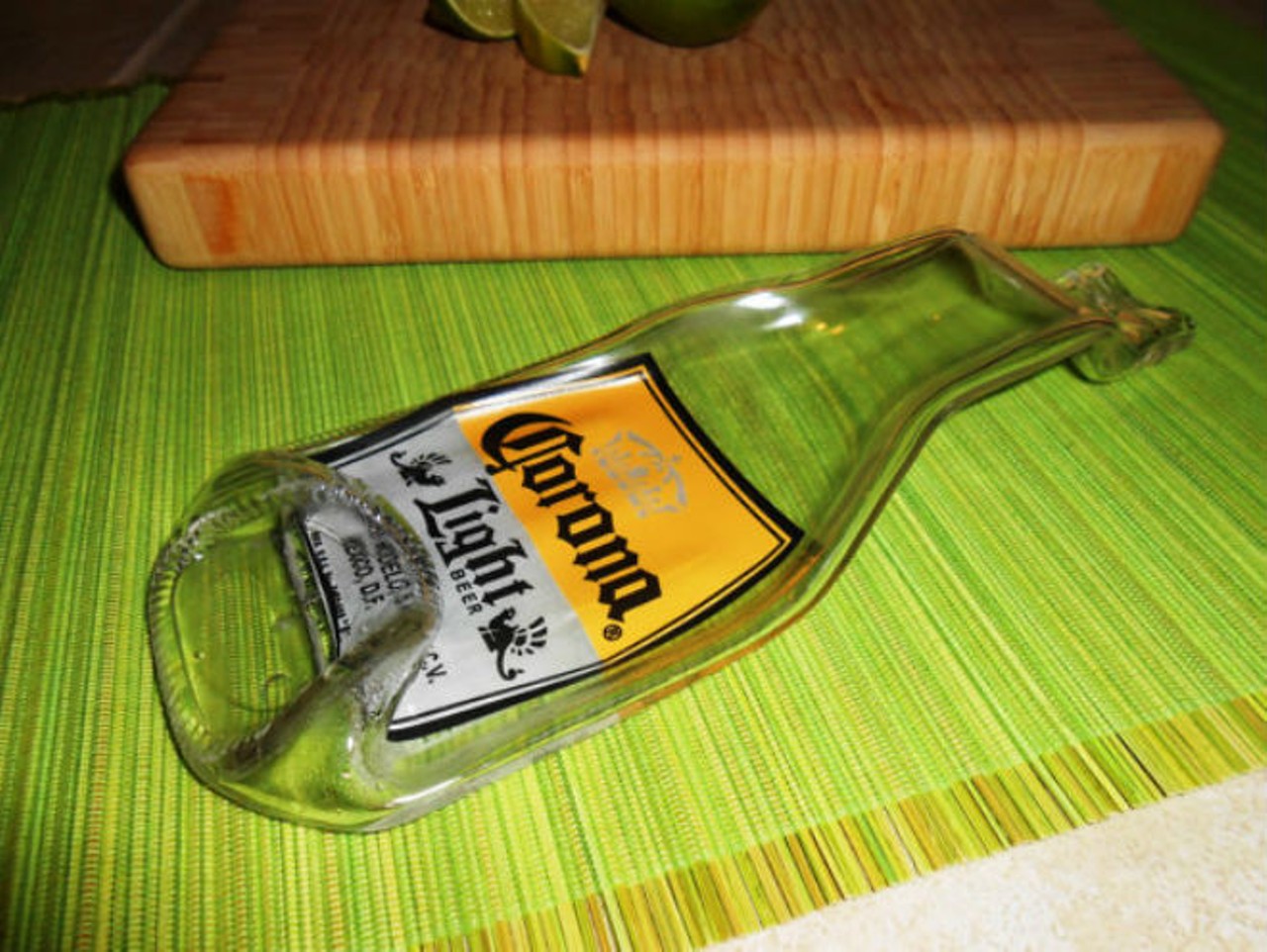 Sunshine Art Glass
"Upcycled" Corona Light bottle; $12
Apparently this can be used as an ashtray, change dish or even a spoon rest
Photo via Sunshine Art Glass