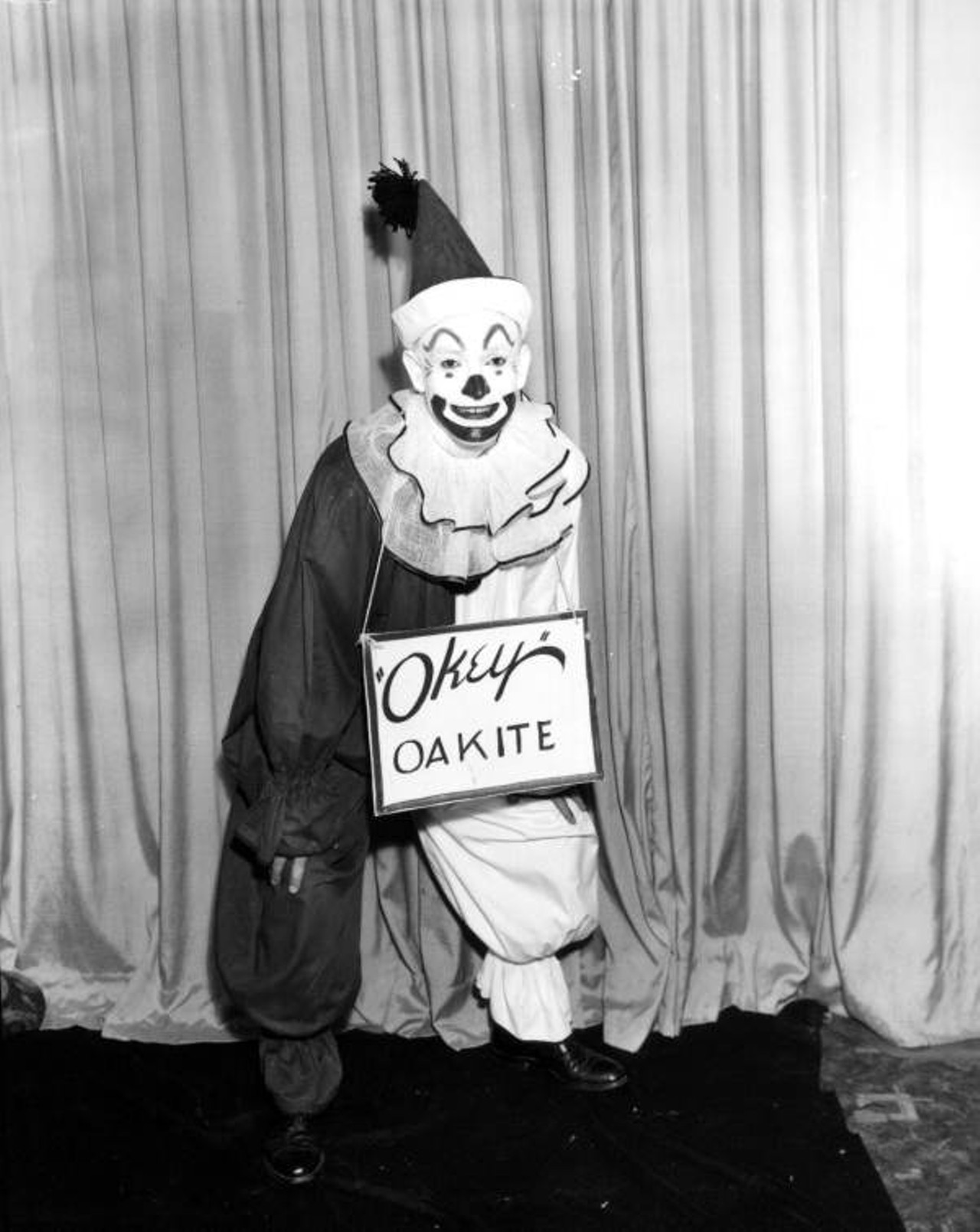 A clown with a sign (via floridamemory.com)