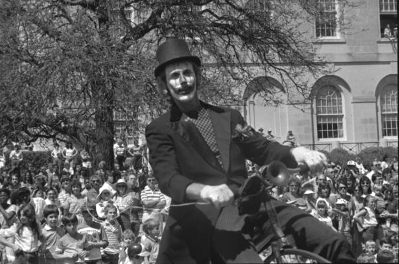A clown rides a bike at the Springtime Parade in Tallahassee, circa 1984 (via floridamemory.com)