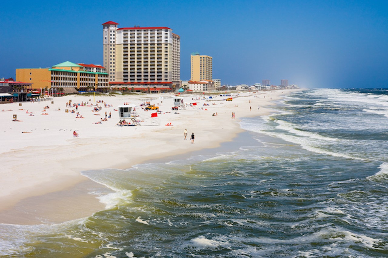Pensacola Beach
Estimated driving distance from Orlando: 6 hours and 30 minutes 
Besides one alcohol-free zone west of the pier, alcohol is permitted on Pensacola Beach in non-glass containers. The beach is accompanied by a flourishing commercial district which houses many shops, open-air bars, nightclubs, and restaurants. It&#146;s also known for its sugar-like sand and crystal clear waters. 
Photo via Adobe