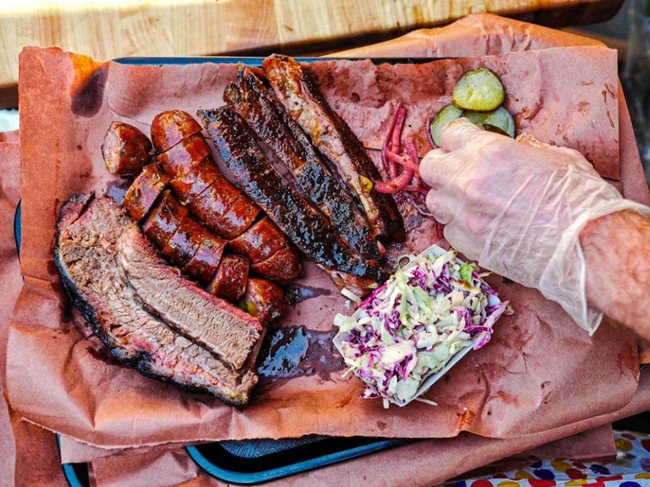 Smokemade Meats and Eats
1400 S. Crystal Lake Drive, Orlando
The stellar pop-up run by Tyler Brunache will bring Central Texas-style barbecue to the old Italian House Restaurant space. His brisket might be the best in the city, but other items like cheddar-jalapeño sausage, ribs, smoked turkey and bangin’ sides and desserts will set barbecue fiends afire.