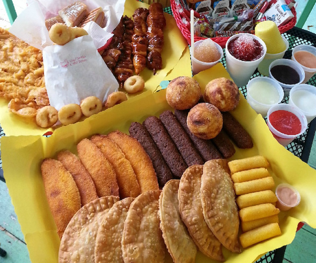 Coqui Snacks  
3018 Lions Court, Kissimmee, 407-846-4126
This pint-sized Puerto Rican restaurant specializes in empanadas, taquitos and mini donuts. Stop by on a Saturday for a special serving of pinchos with tostones. 
Photo via Coqui Snacks