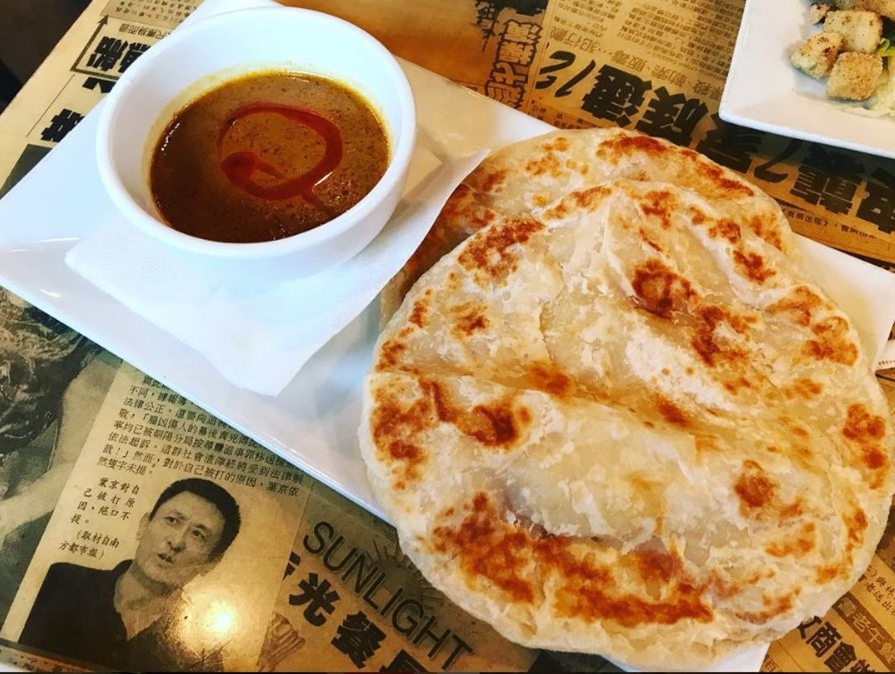 Roti canai from Hawkers Asian Street Fare
1103 N. Mills Ave., 407-237-0606 
The real appeal of the Malaysian flatbread dish may be in the spicy curry dipping sauce. You might think you can resist multiple servings of the flatbread, but chances are you'll cave after the first bite.
Photo via ravenousclaw/Instagram