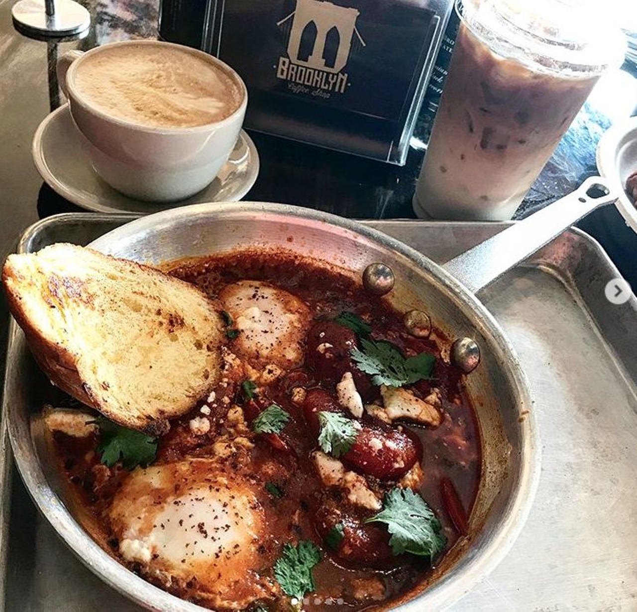 Brooklyn Coffee Shop
Besides coffee, this new option in the heart of Mills 50 also serves food. We like their shakshuka &#150; eggs baked in a spicy red tomato-and-pepper sauce &#150; served daily from 11 a.m. for $7, though $2 Empanada Mondays are also worth a look.
Photo via  orlando.treasures/Instagram