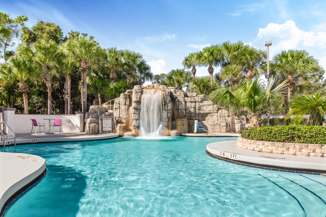 Crowne Plaza Orlando Lake Buena Vista
8686 Palm Parkway, Orlando, 407-239-8400
$10-$20
The bright pink chairs and waterfall will whisk you away from the hustle and craziness of Orlando. This is the perfect spot if you want a long daycation with the pool closing at 11 p.m. There are also food and drink services available until 1 p.m. The purchase of the day pass also includes free parking and Wi-Fi.
