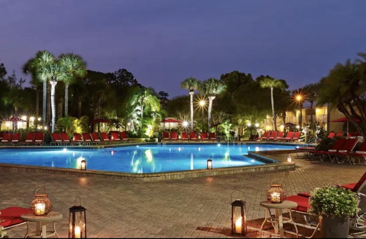 Wyndham Orlando Resort International Drive
8001 International Dr, Orlando, 407-351-2420
$20-$40
This resort features three outdoor pools and the restaurant Gatorville Poolside and Bar. (Can that name be anymore Floridian?) The red lounge chairs and umbrellas are a nice welcome for a daycation, with even a view of the ICON Park Wheel. With the hours of the pool being 8 a.m - 6.pm, take advantage of that complimentary parking and explore International Drive after your pool day.