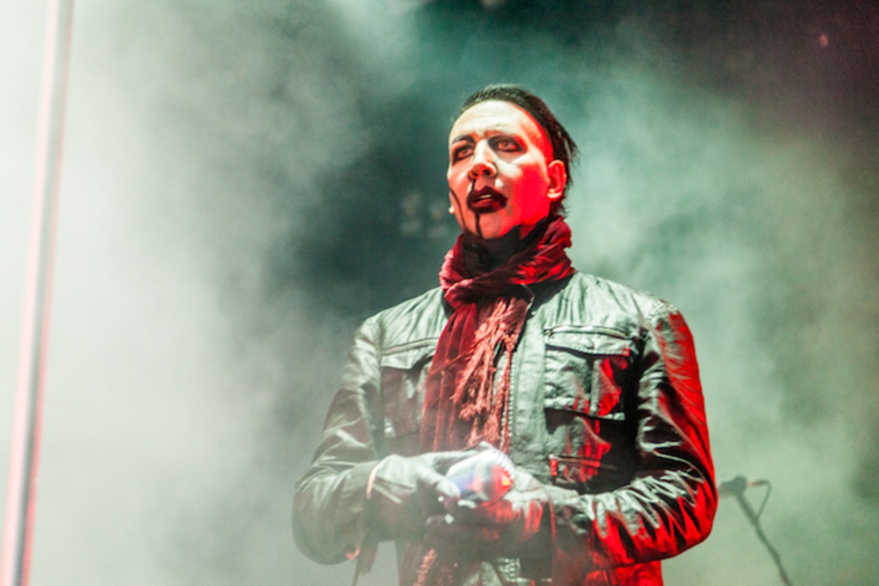 Marilyn Manson is probably thinking about how much money he saved on car insurance by switching to GEICO. Photo by Carlo Cavaluzzi.