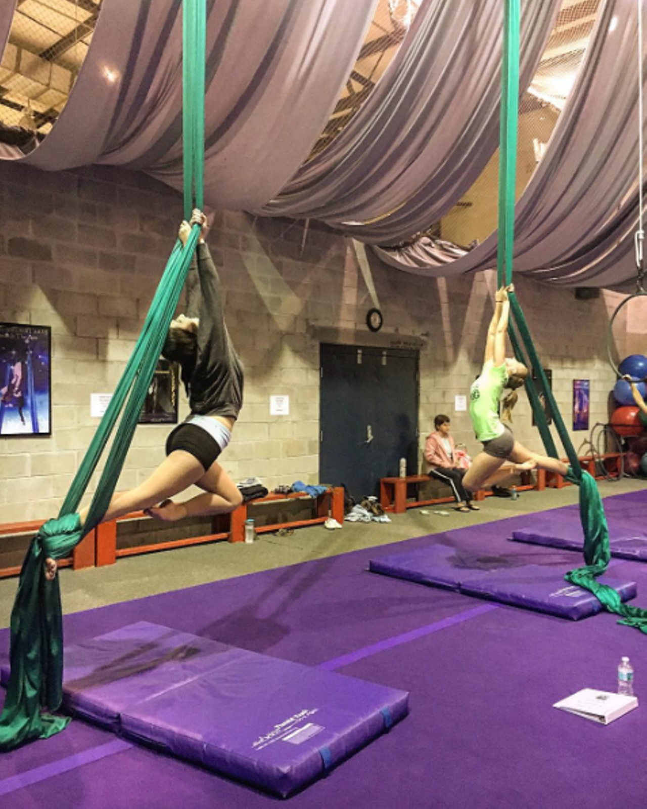  Take an Aerial Silks Class
6700 Kingspointe Pkwy, Orlando, 863-414-8061
If you aspire to become part of Cirque du Soleil or maybe just want to imitate the cool-looking aerial dancers at your favorite pop star&#146;s Grammy performance, Orlando Aerial Arts is a good starting point. All of their aerial silk classes are open to people of all levels and beginners start off with just some basic climbs and poses on the silks. If you actually do aspire to become a professional, they even work with you on developing choreography for your own routines. Classes last about an hour and run you $20. 
Photo via shellatrist/Instagram