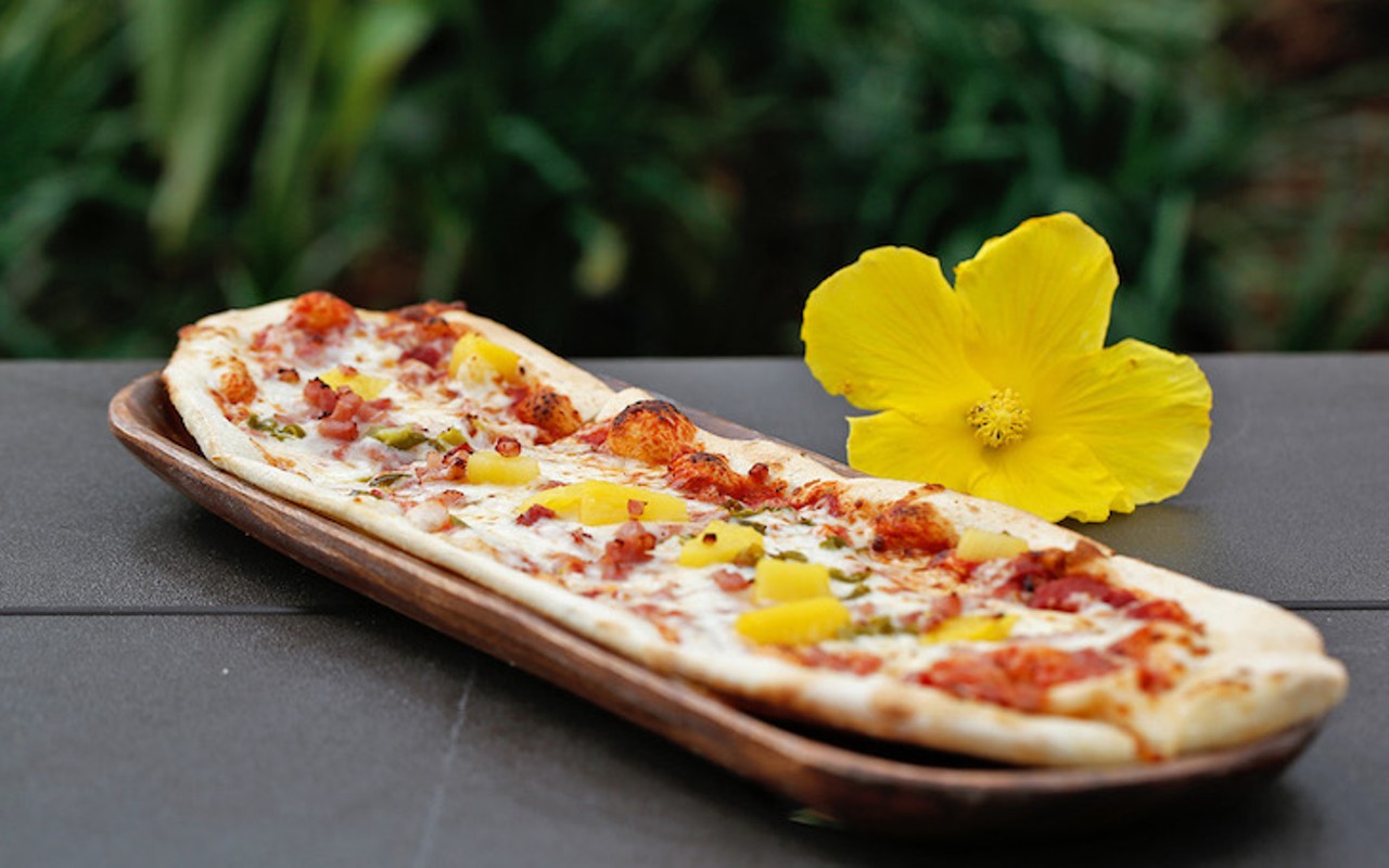 Volcano Bay
Hawaiian Longboard Pizza
Surfboard-shaped pizzas from Whakawaiwai Eats come in a variety of styles including Hawaiian, vegetable, barbecue and more.
Photo via Volcano Bay