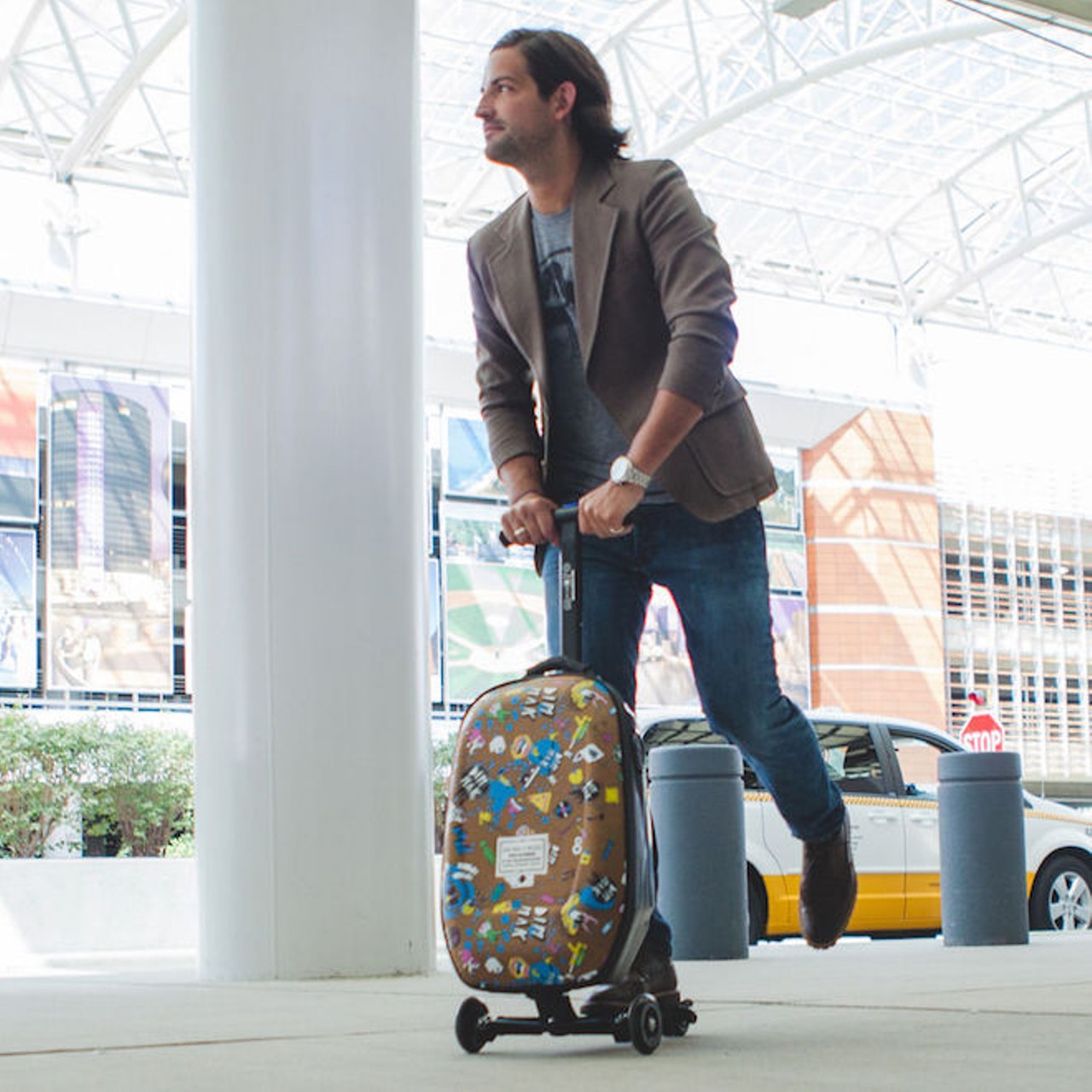 The Steve Aoki kickboard luggage scooter with bluetooth speaker.