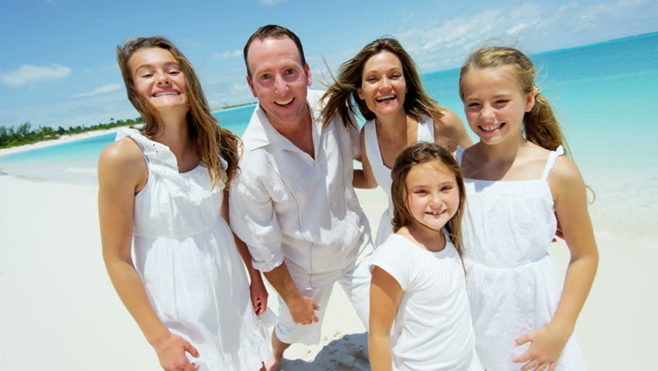 It&#146;s not uncommon to see entire families wearing matching white outfits on the beach 
Photo via Shutterstock