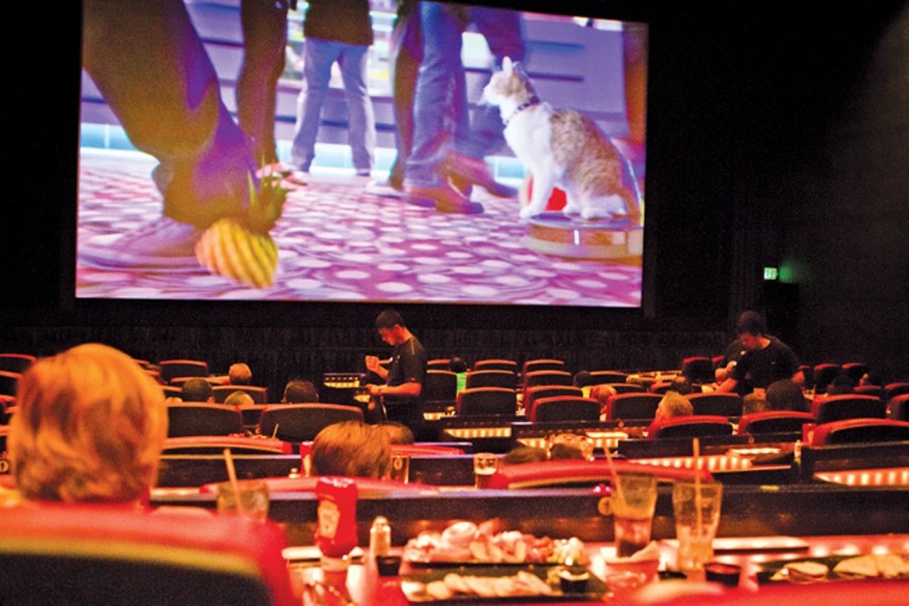 Dinner and a movie at Aloma Cinema and Grill
2155 Aloma Ave., Winter Park, 407-671-4964 
All movies before 6 p.m. are $5, but even movies after only rise up $2.50 to $7.50. Dinner and drinks will cost you extra, but for a movie that cheap you can afford to splurge.
Photo via Aloma Cinema and Grill