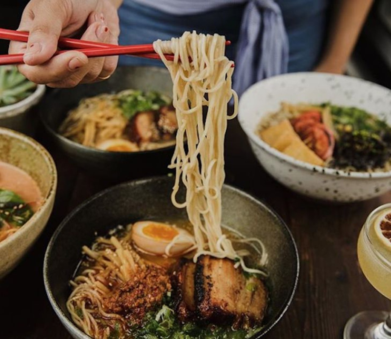 Domu
East End Market, 3201 Corrine Dr. Suite 100, (407) 960-1228
Popular ramen joint lives up to the hype offering near-perfect bowls of tonkotsu, shoyu, miso and curry ramen. There&#146;s an uni pasta for those who want to forgo broth for the richness of sea urchin, but don&#146;t overlook other soupless options like the crackling good Korean fried chicken with butter sauce and the grilled octopus. Cocktails are taken seriously here.
Photo via domufl/Instagram