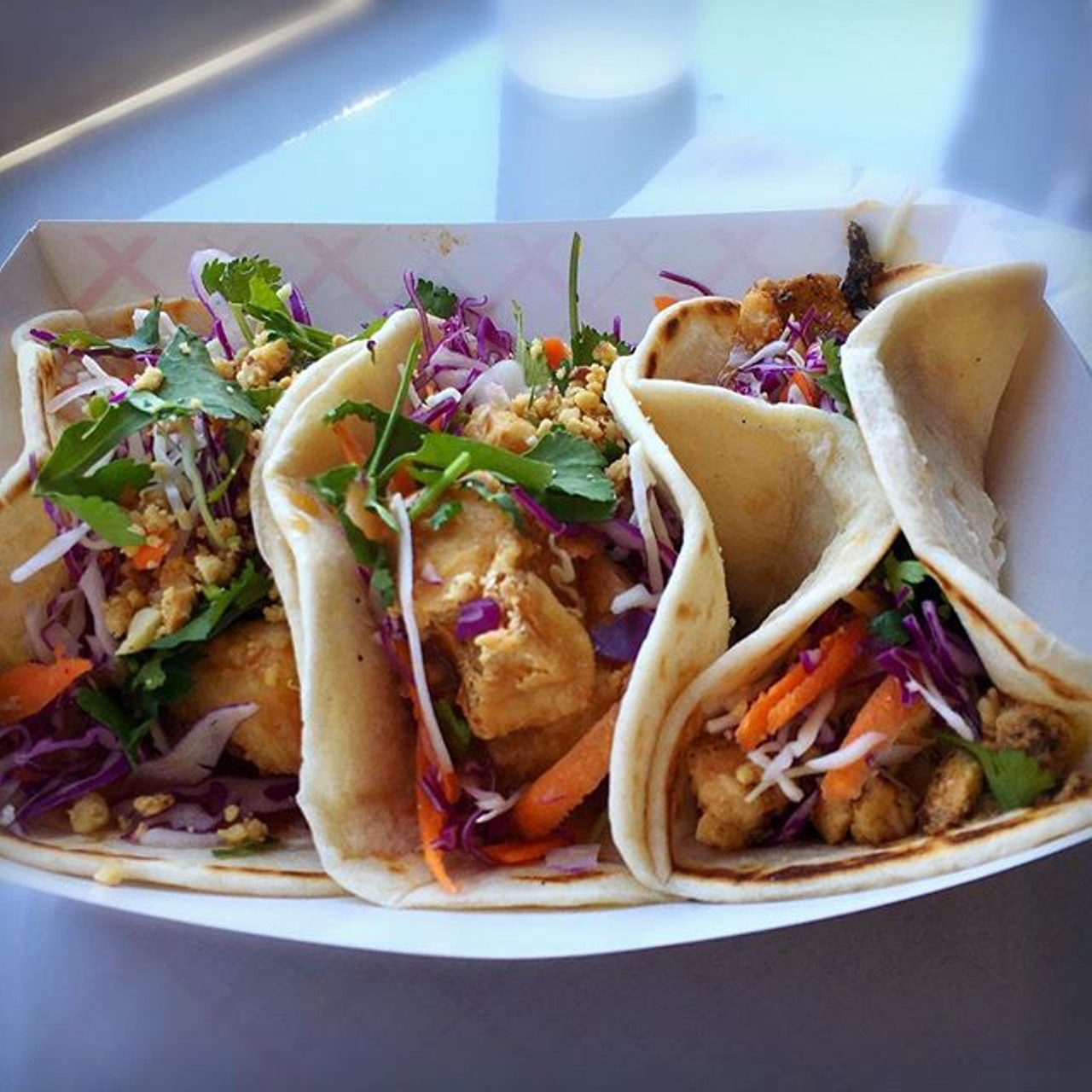 Thai Peanut Chicken taco from Tako Cheena
932 N. MIlls Ave.
The Thai peanut chicken crushes it (literally). The chicken house taco with a hint of sweetness comes with crushed peanuts and mixed cabbage, cilantro and scallion.
Photo via jeffus3/Instagram
