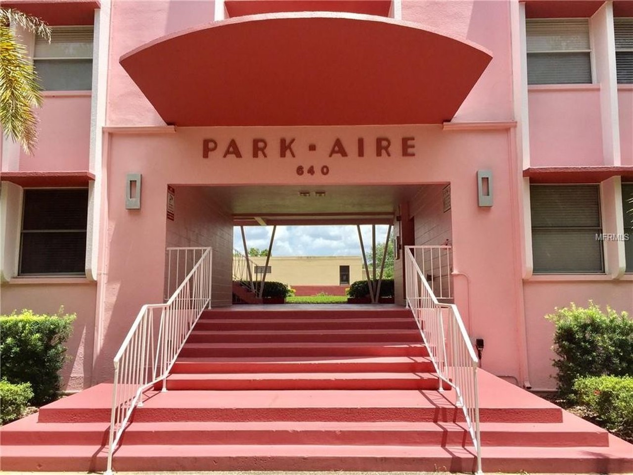 Park Aire Apartments Entrance 
640 N. Park Ave.
Baker-Miller pink, the tone of pink that&#146;s known for its calming effect, is splattered all across the Park Aire. The entrance has been used by musicians and Instagrammers alike who want to capture the unique vintage aesthetic. 
Photo via Realtor.com