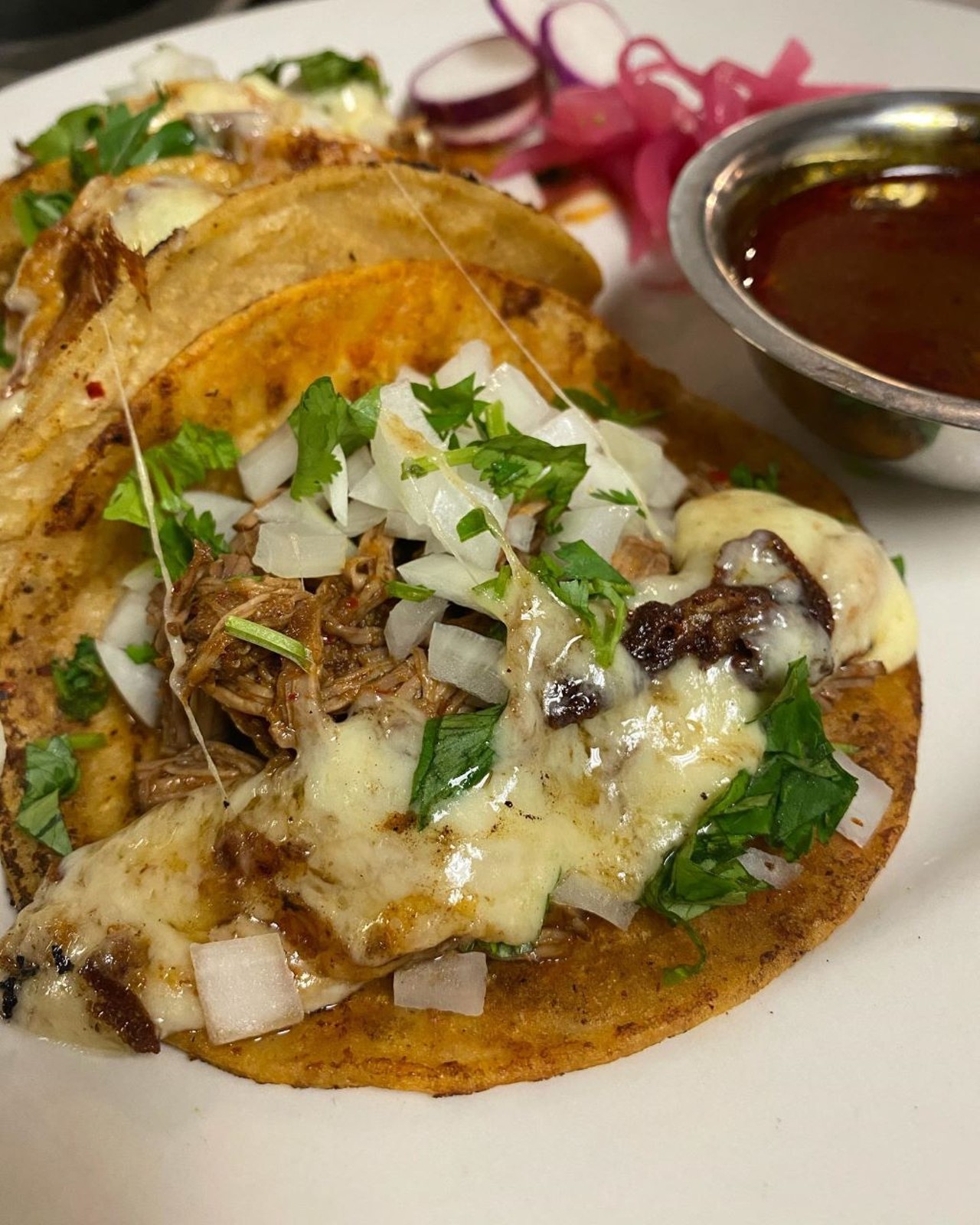 Coco Bar and Tapas 
104 S. Eola Drive
Whether it&#146;s in a tamale, burger, or taco, Coco Bar and Tapas has the perfect birria dish waiting for you. Pro tip -- stop by for brunch (birria included) and grab a bottomless mimosa or sangria. 
Photo via Coco Bar and Tapas/Facebook