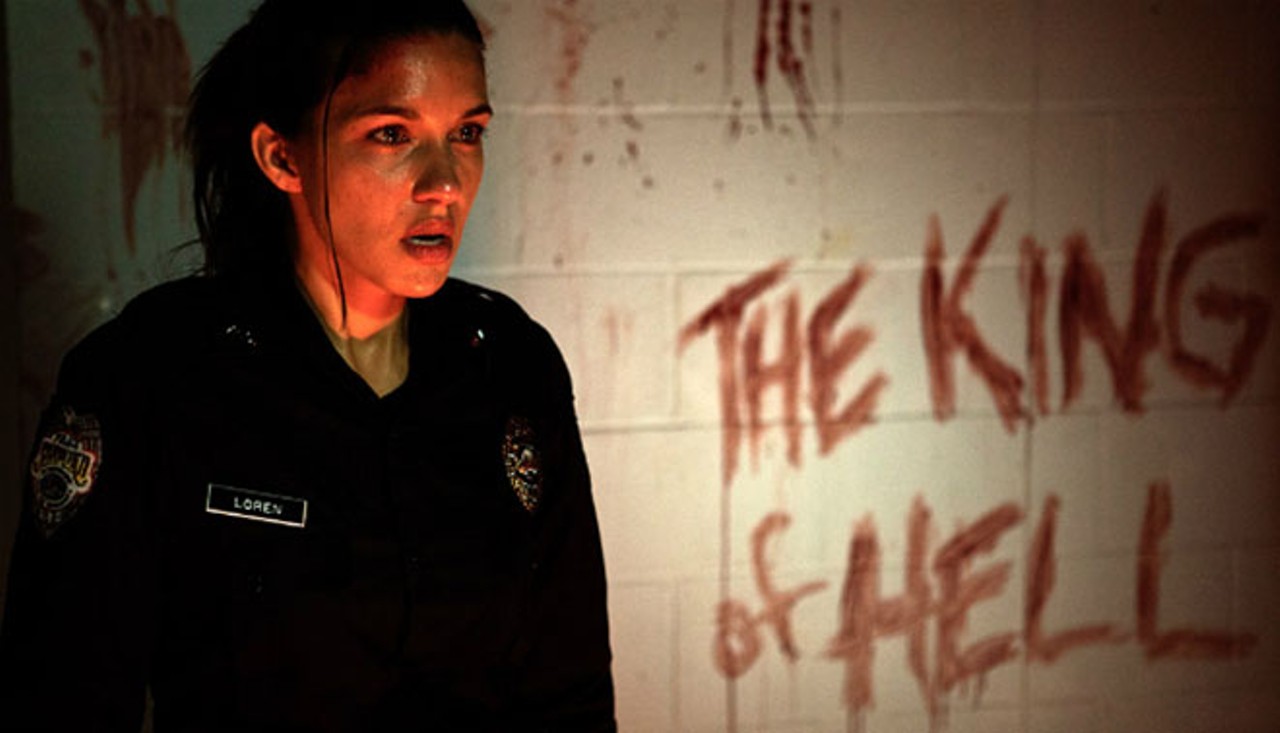 11. Last Shift (2014)
Filmed in Sanford, Fla.
Officer Jessica Loren should've done a little more research before taking a job at this closing police station. Told to wait for a Hazmat team to pick up biohazard waste, Loren gets terrorized by the ghost of cult leader John Michael Paymon who committed suicide in the police station a year ago.
