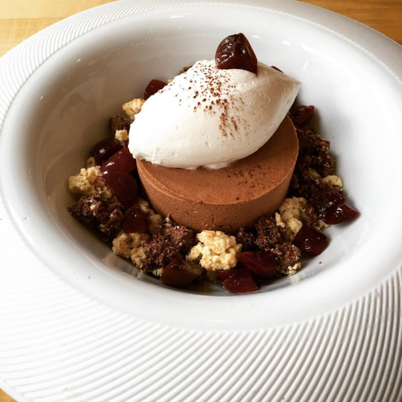 Chocolate Mousse Cake at Osprey Tavern
Beyond the dark and white chocolate crumble and cherry chantilly cream, the Luxardo cherries, which go for about $20 for a 14-ounce jar) are an upscale addition to this dessert.
4899 New Broad St., 407-960-7700
Photo via klcarlucci/Instagram