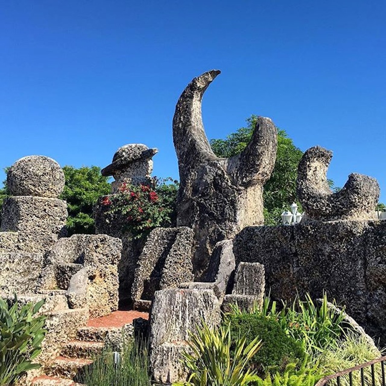 Coral Castle
28655 S Dixie Hwy, Homestead, FL 33033 | (305) 248-6345 
After his beloved Agnes left him a day before their wedding, early 1900s sculptor Ed Leedskalnin took 30 years to handcut gigantic pieces of stone into the works of art that you see today at Coral Castle. The whimsical shapes and designs made from rigid stone are perplexing to say the least. 
Photo via happy_less/Instagram