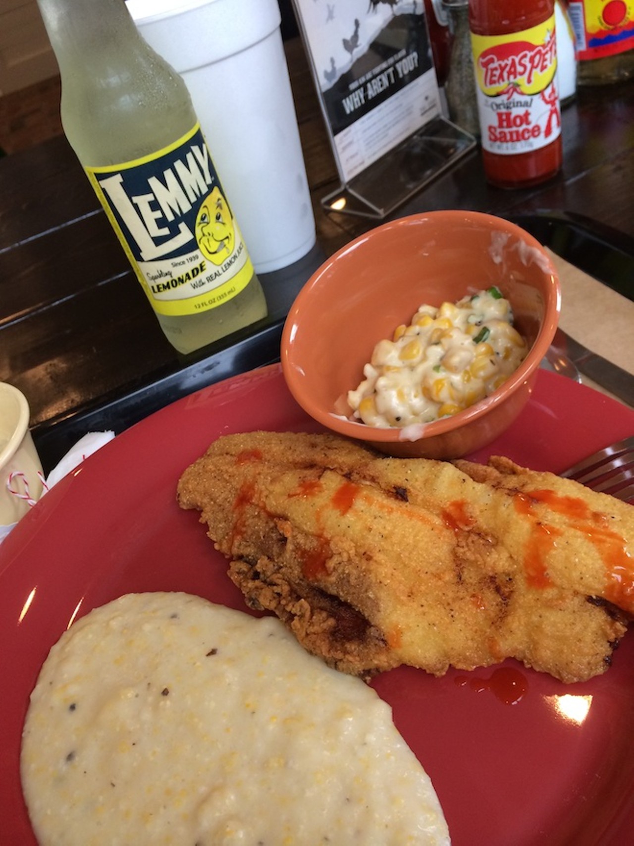 Fried catfish, grits and creamed corn.