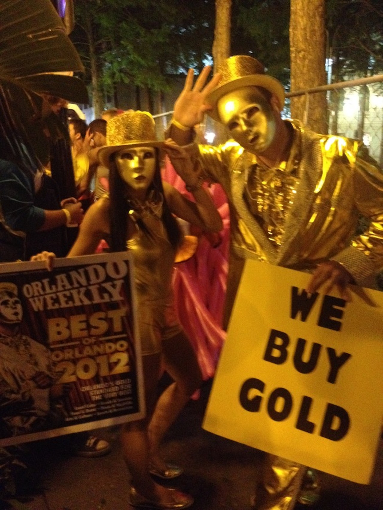 People dressed as Mr. Gold at Wall St. Plaza's Plazaween