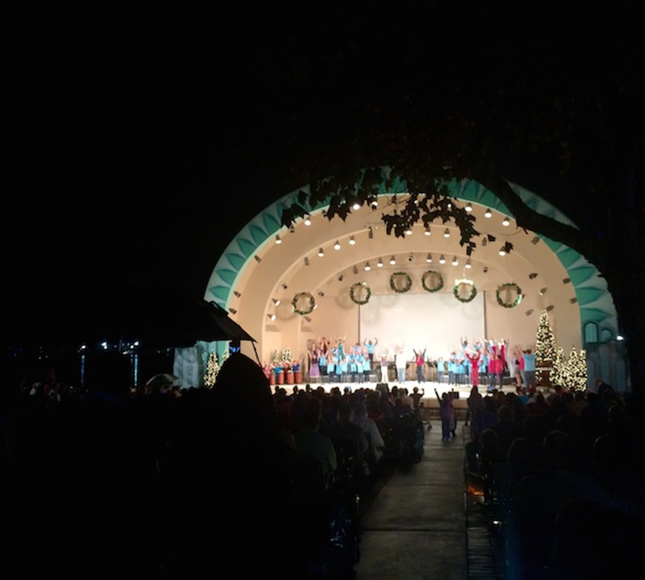 Orlando Christmas tree lighting show in Walt Disney amphitheater at Lake Eola