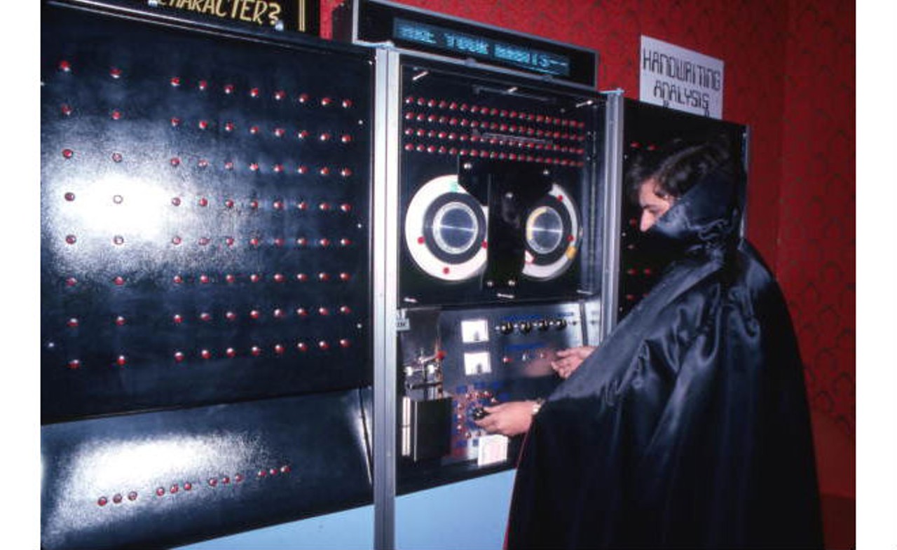 Employee at the controls of a machine at Mystery Fun House