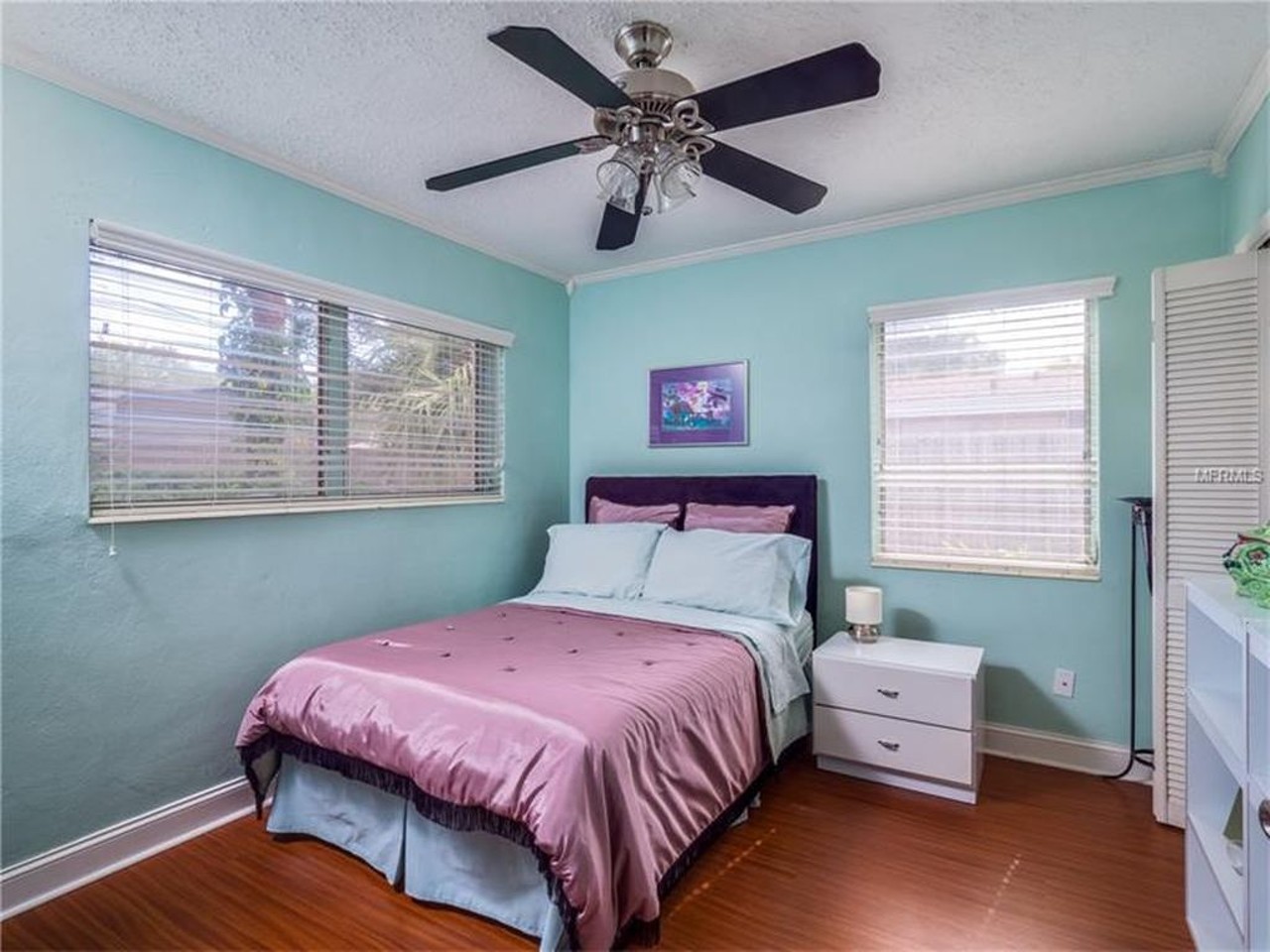 3701 Virginia Drive
3 beds, 2 baths, 2,044 square feet, $289,999
The home's bright, airy feel continues to the bedroom.