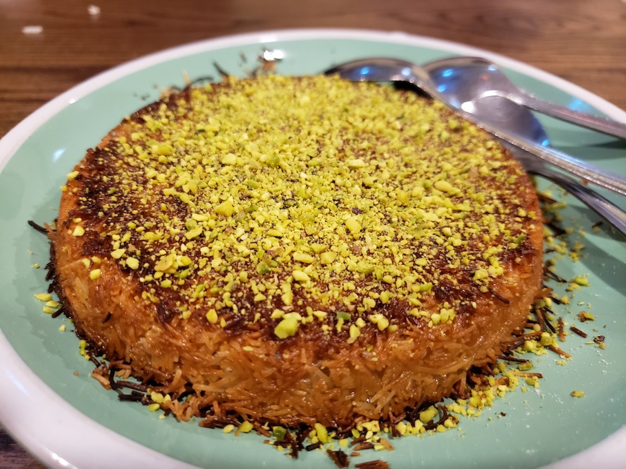 
Kunefe, Istanbul Grill
The cheese-filled, phyllo-threaded, pistachio-topped pastry is an absolute favorite of mine, and the version served here is unexpectedly devoid of the syrup that typically pools around the base, making for a significantly lighter, and less cloying, capper to a meal.
