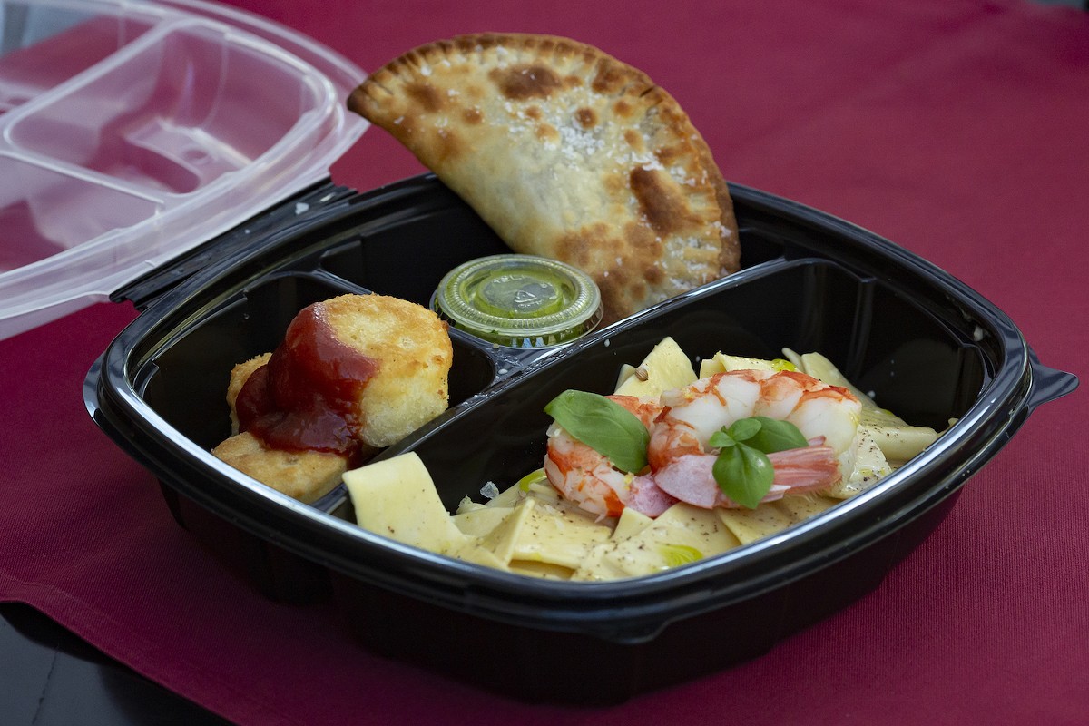 Vinia's 'bento box' includes freshly made beef and cheese empanadas, some of the best I've had anywhere.