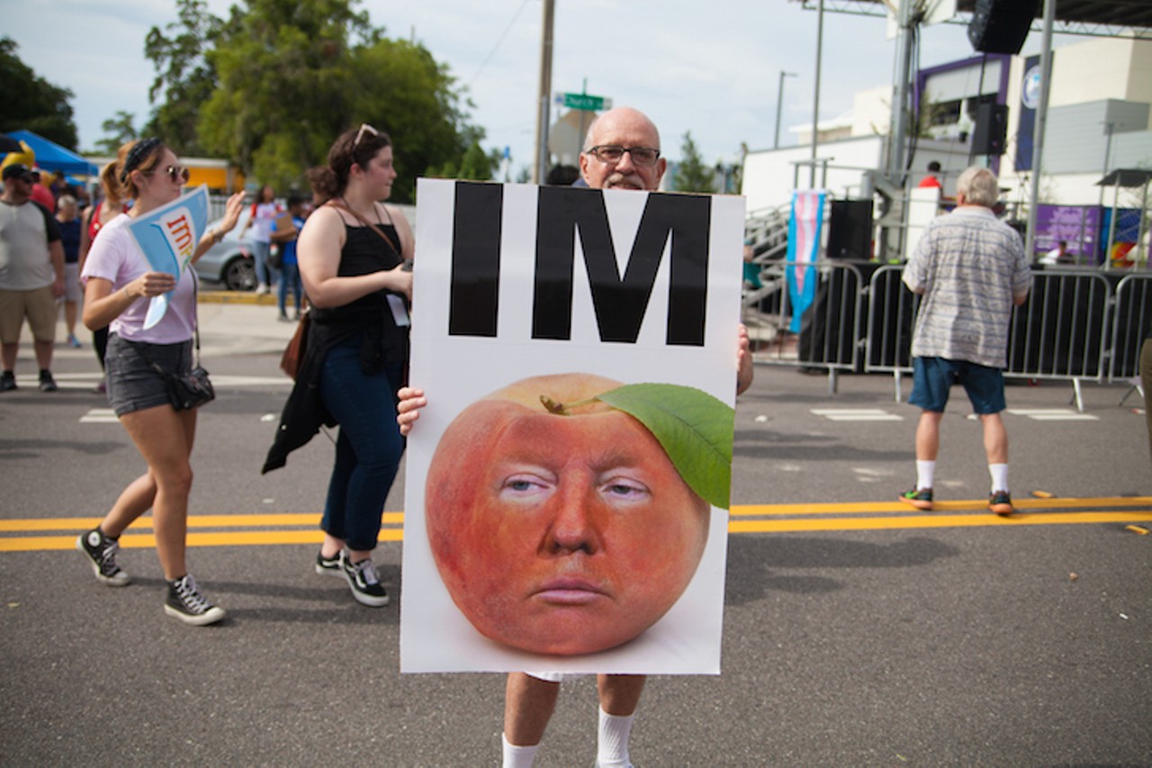 All the best signs we saw at the Win With Love anti-Trump protest